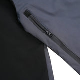 Close-up of the waterproof #5 zipper with thumb puller used for the main front closure of the Mountain Sigma Outdoor Textile Jacket.